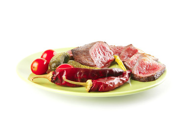 red beef slices on green dish