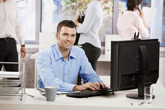 Office life - businessman working at desk