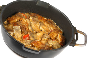 Braised fish in a frying pan