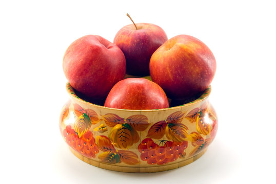 apples in wooden dish