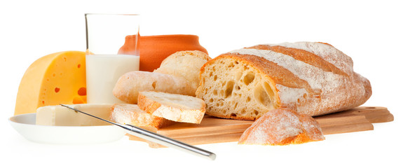piece of butter, bread and a knife