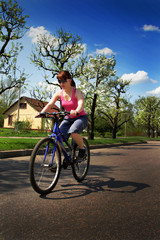 young lady driving a cycle