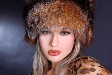 lovely young woman in winter fur hat