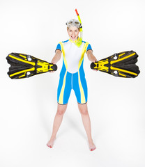 standing young woman wearing neoprene with snorkeling equipment