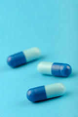 set capsules on blue background