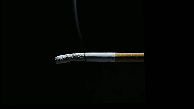 Cigarette on blac background