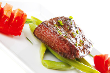 roast fillet served with tomato