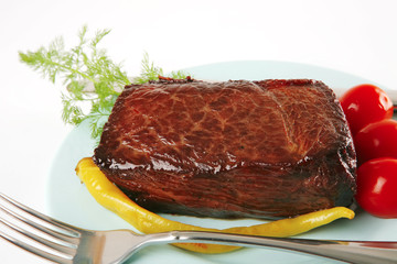 meat block on blue dish