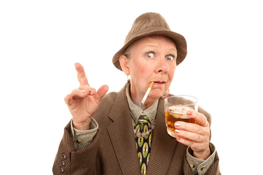 Senior woman in drag with cigarette and alcohol