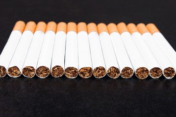 Cigarettes on black background