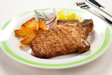 Fried pork chop with vegetables