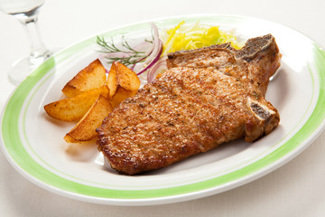 Fried pork chop with vegetables