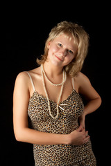glamor young woman dressed in a leopard dress