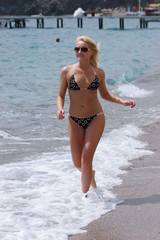 Obraz premium Sexy woman on the beach