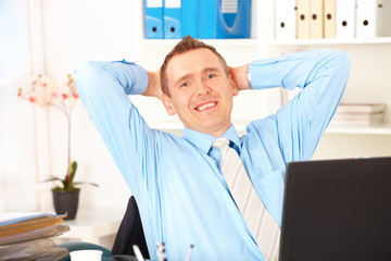 Fototapeta premium Happy businessman sitting