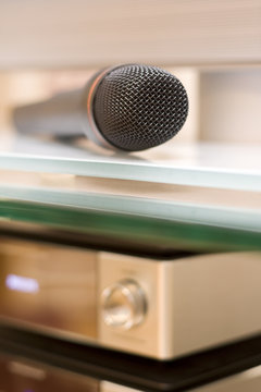 Microphone on Glass Shelf