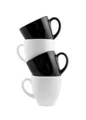 Black and white cups in stack isolated