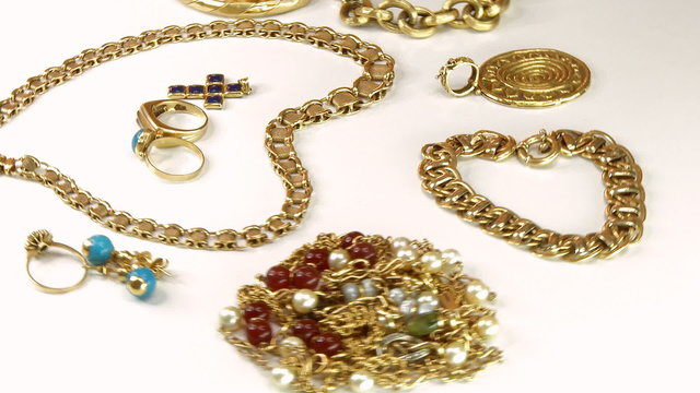 Vintage jewelry in gold rotating