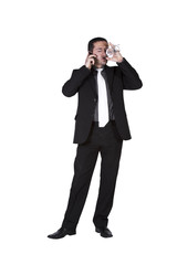 Businessman celebrating with a glass of drink and a smoke