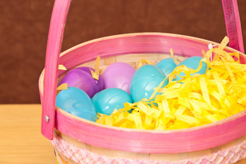 Blue and Purple Easter Eggs in Basket