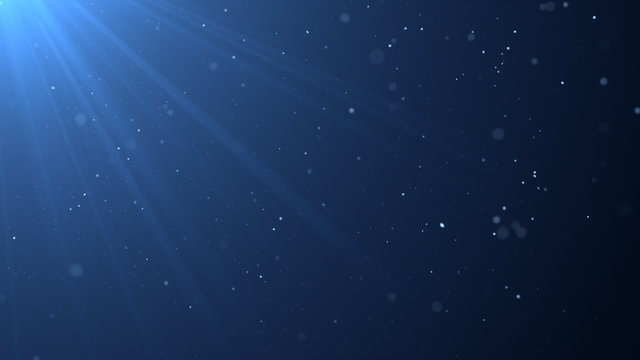 Blue background with sunbeams and particles