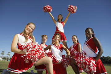 cheerleading squad in formation on field portrait (portrait)