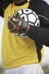 Soccer Goal Holding Soccer Ball