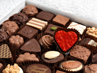 red sweet heart in a chocolate box