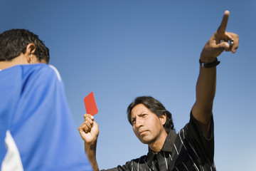 Referee Ejecting Soccer Player from Game