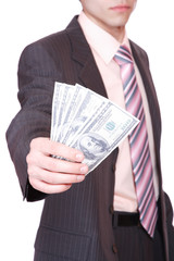 businessman holds money in a hand