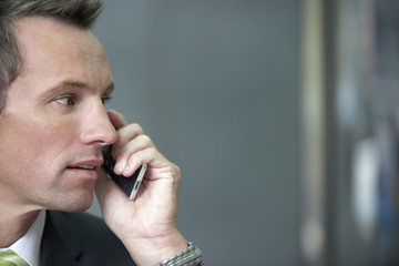 businessman using cell phone portrait