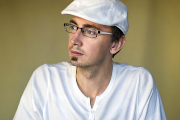 Serious man in white