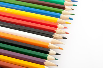 colored pencils on white background