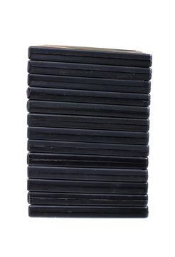 Pile of DVD boxes isolated on white background..
