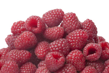 Fresh red  raspberries on white background