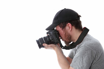 Mann Fotograf mit Kamera schräg nach unten