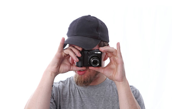 Fotograf Mann mit Kompakt Kamera beim Fotografieren