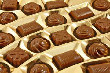 Chocolate sweets in  golden box