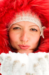 portrait of young woman with snow