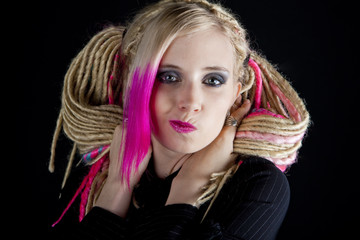 portrait of young woman with dreadlocks