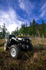 Parked ATV at mountain top vista