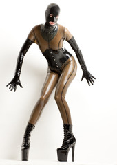 standing woman wearing latex clothes