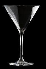 Martini glass isolated on a black background.