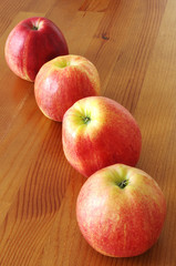 Four apples on the table