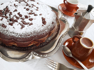 Chocolate Cake on silver tray at Breakfast.