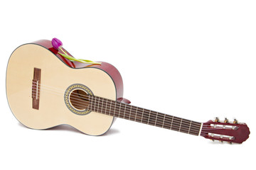 Obraz na płótnie Canvas a yellow acoustic guitar isolated on white