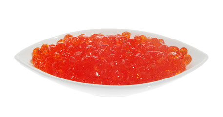 Red caviar in a white plate. (salmon)