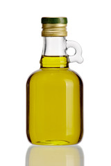 Olive oil in original bottle on a white background close-up