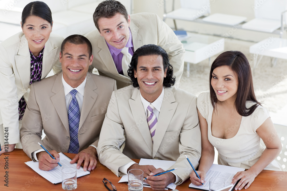 Wall mural cheerful business team in a meeting