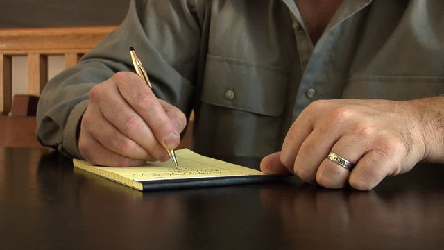Businessman taking notes